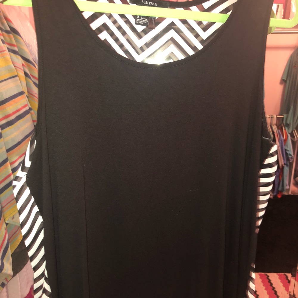 Tank with black and white back
